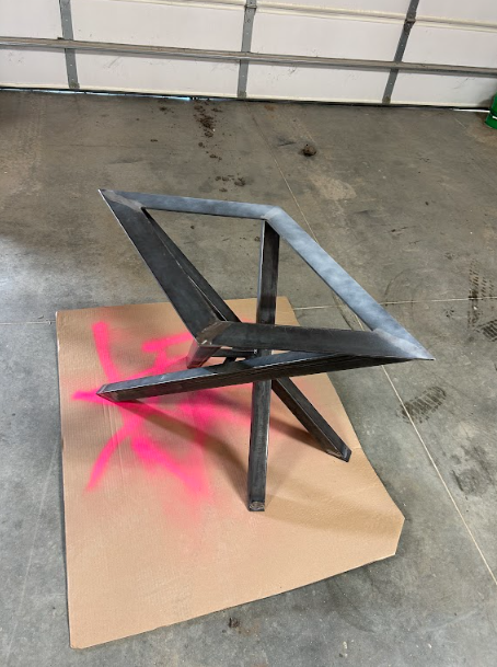 The completed weldment in bare steel, marked up ahead of finishing and coating.