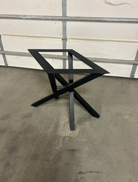The coated base standing square on its four feet, ready for a top to be fitted.