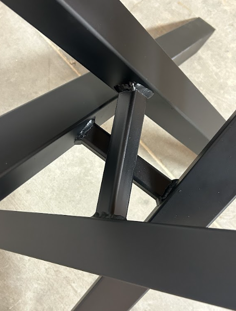 Close-up of the centre crossing joint where the legs and stretcher meet.