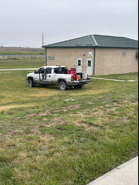 The welding truck set up beside the treatment building, with power, gas and consumables carried to the job.